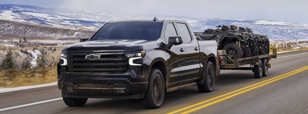 2024 Chevrolet Silverado 1500 towing a trailer
