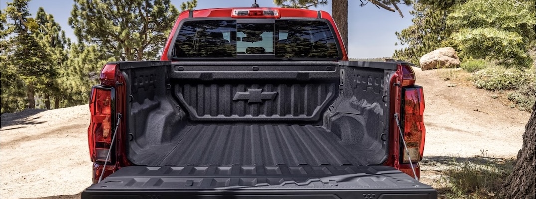 Truck bed of a red 2026 Chevrolet Colorado Trail Boss.