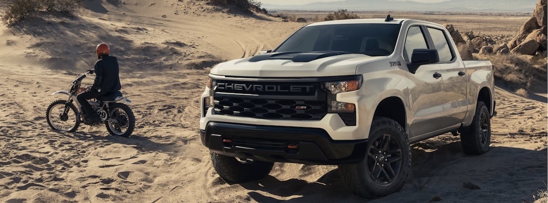 A 2026 Chevrolet Silverado 1500 Trail Boss out on sand.