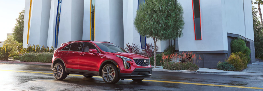 2023 Cadillac XT4 driving down a city street