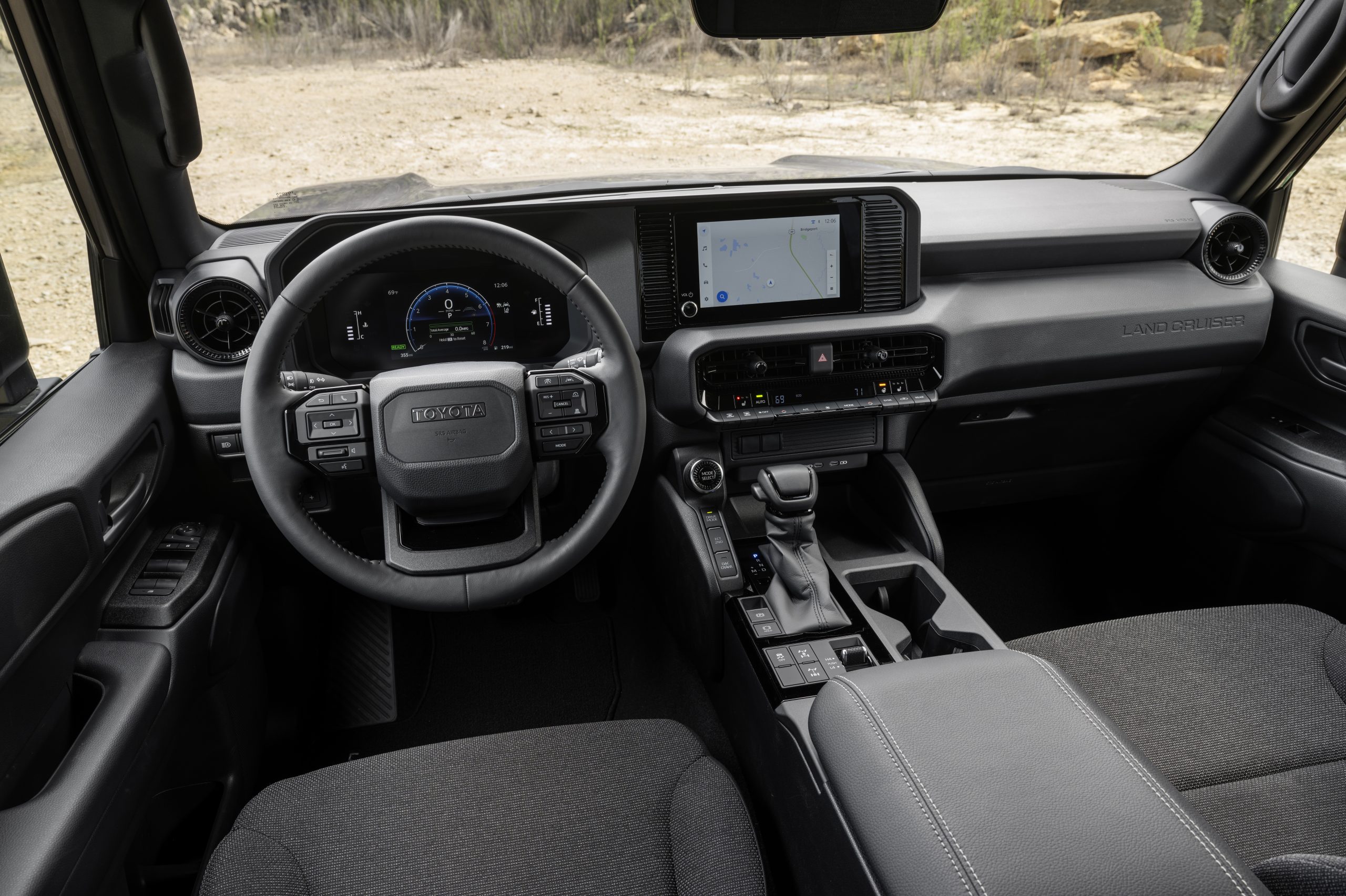 2026 Toyota Land Cruiser interior with digital display and Toyota Multimedia system