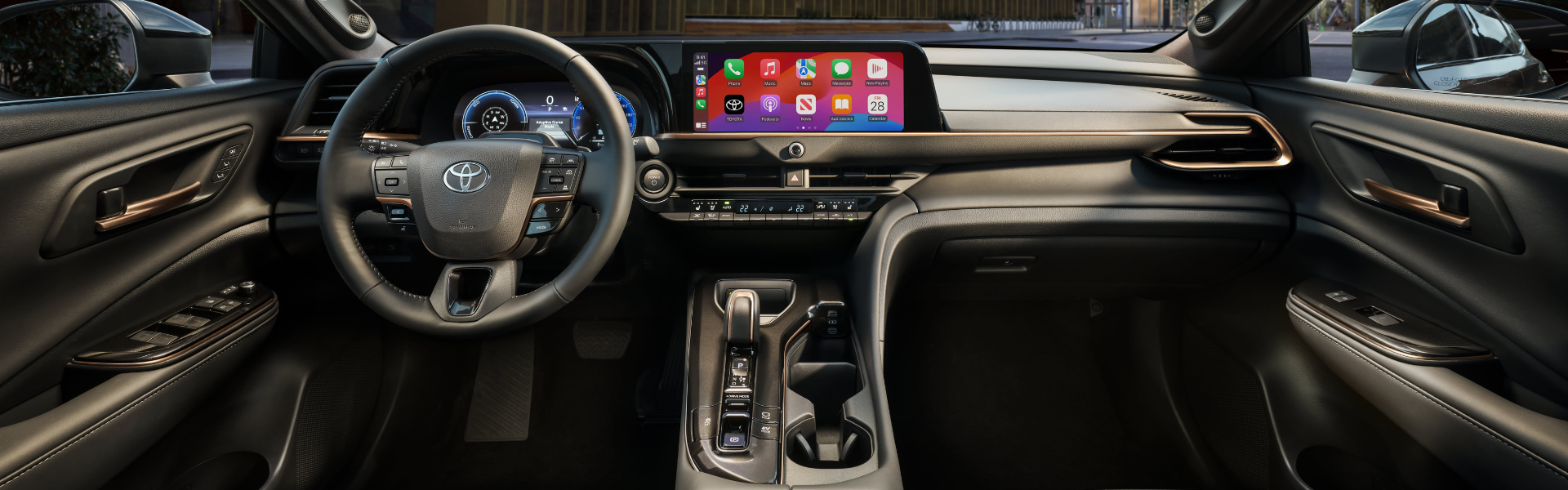 Interior view of a Toyota Crown Signia showing the dashboard, steering wheel, and center display
