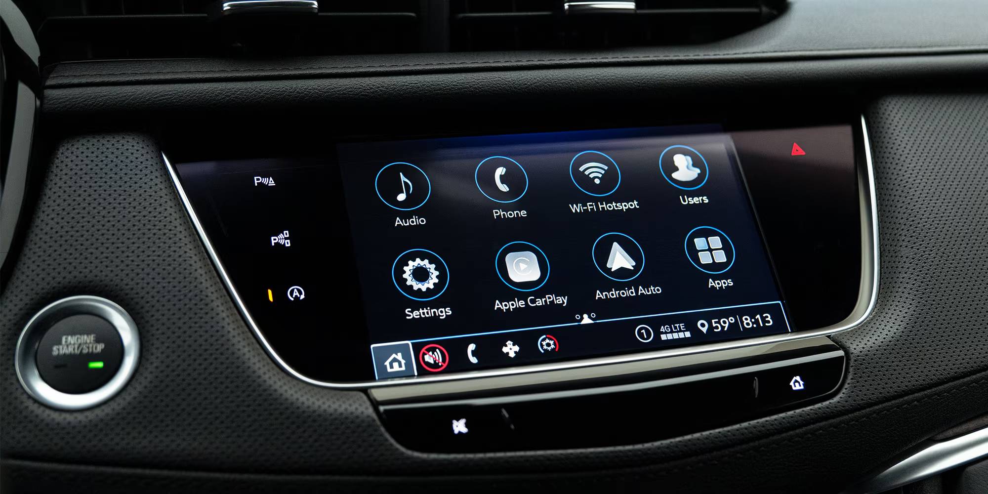 The dashboard touchscreen of a 2026 Cadillac XT5 showing app widgets.