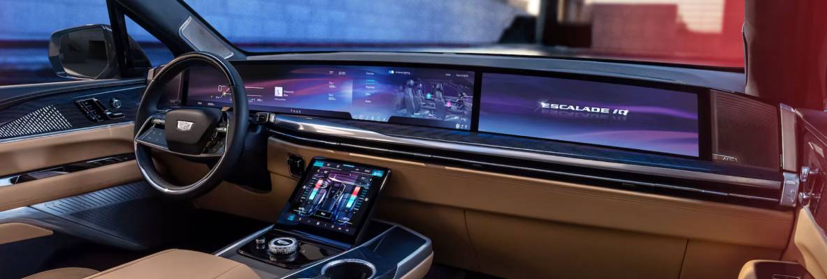 The high tech dashboard of the 2026 Cadillac Escalade IQ, complete with pillar-to-pillar touchscreen display