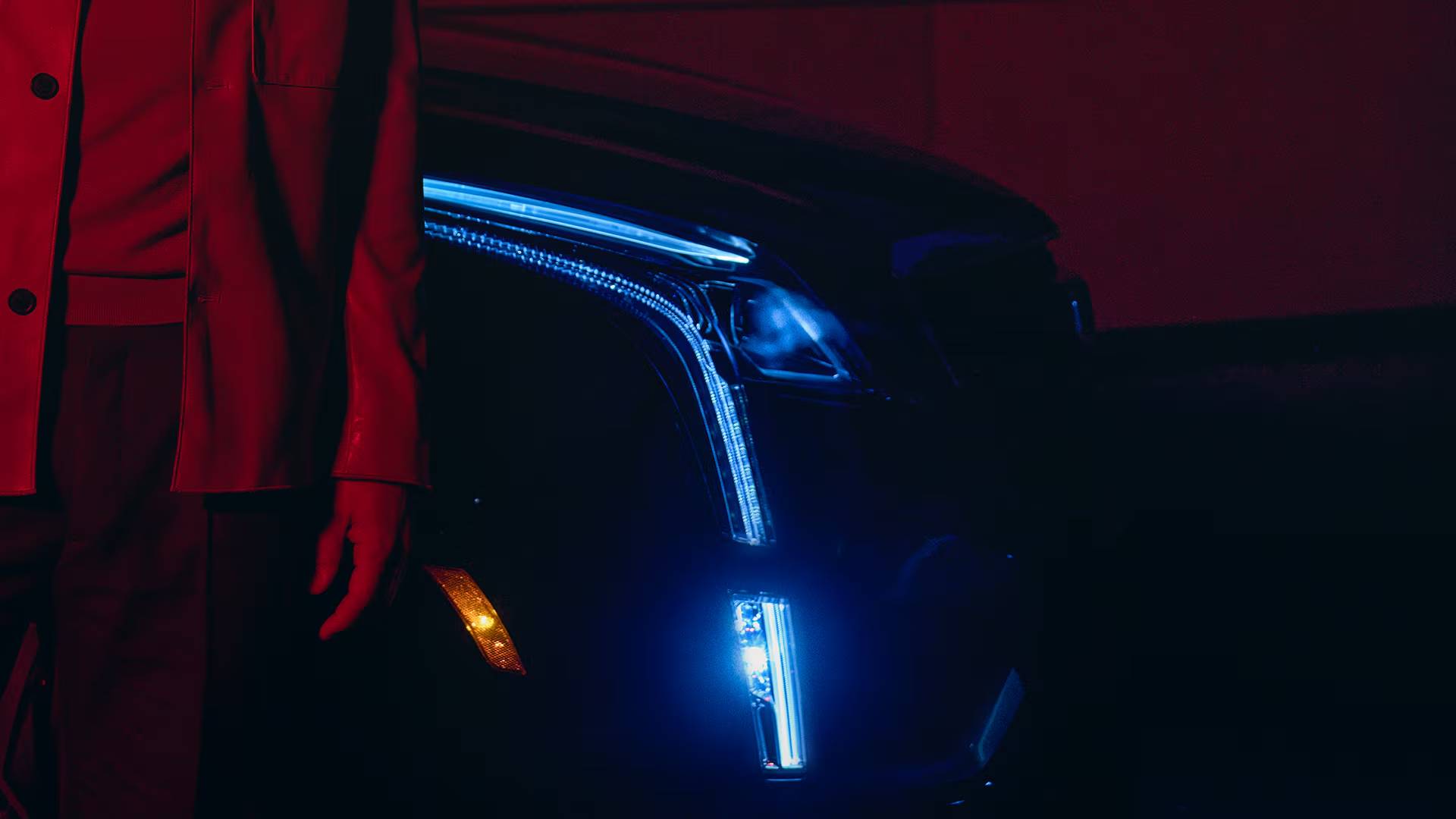The 2025 Cadillac XT5 shows off its statement lighting at night