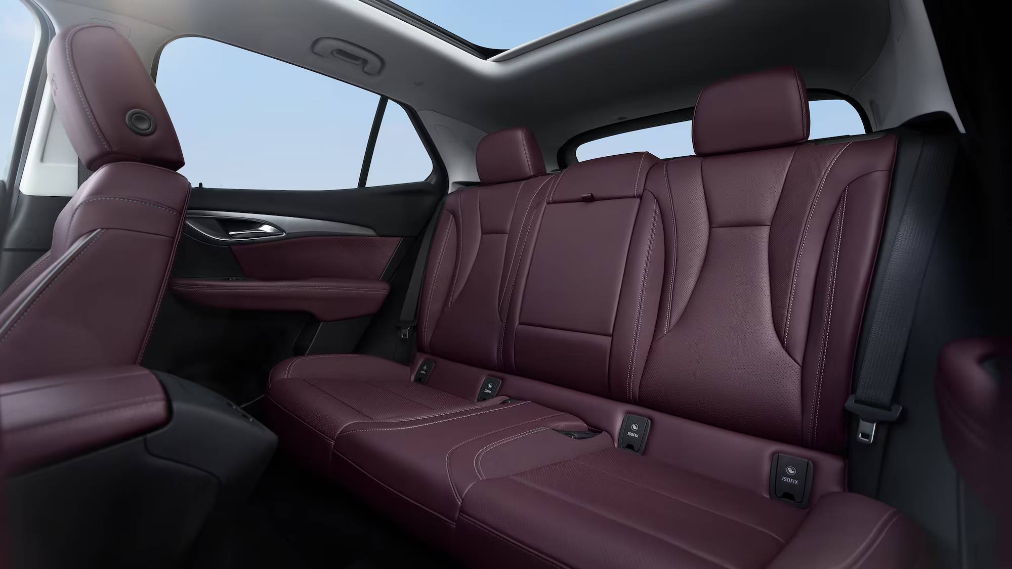 The back row seats of the 2025 Buick Envision. The shot also shows the Envision's windows and moonroof.