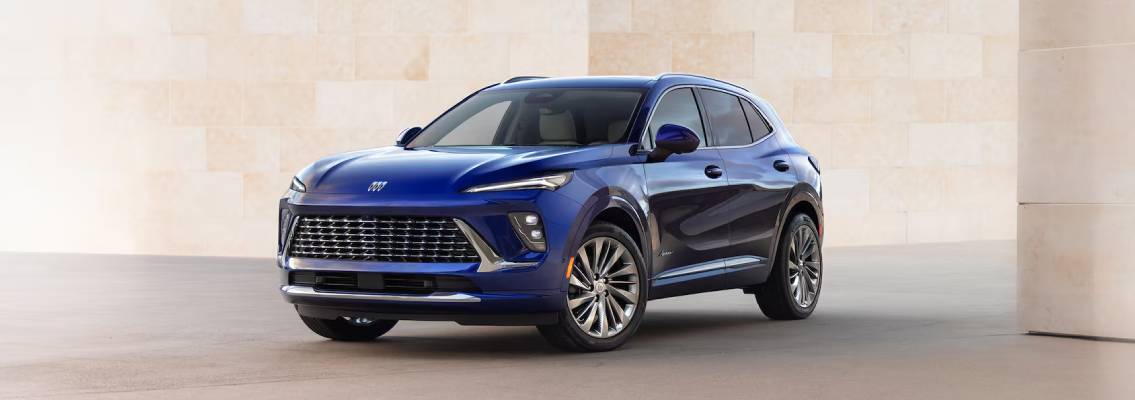 A blue 2025 Buick Envision sits facing the camera at an angle.