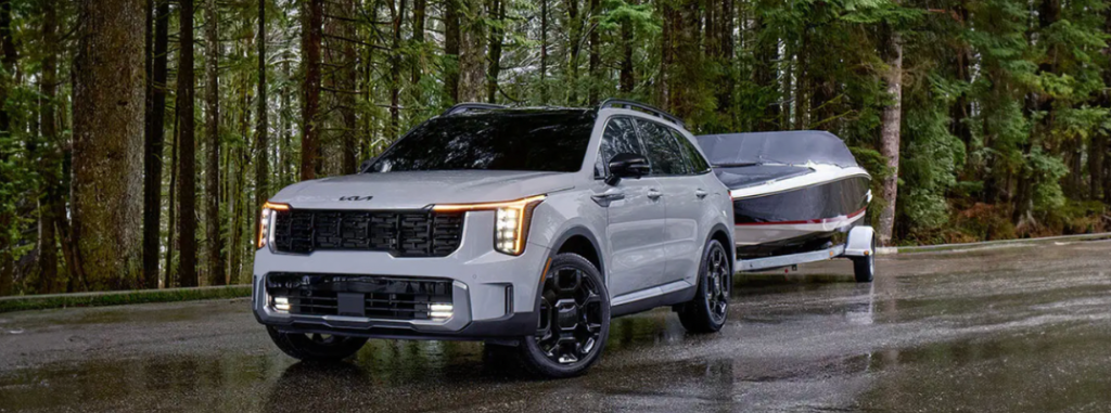 A Kia Sorento towing a boat