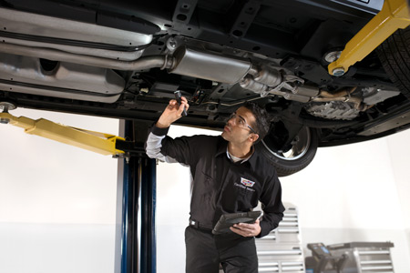 Image of a Technician inspecting a vehicle