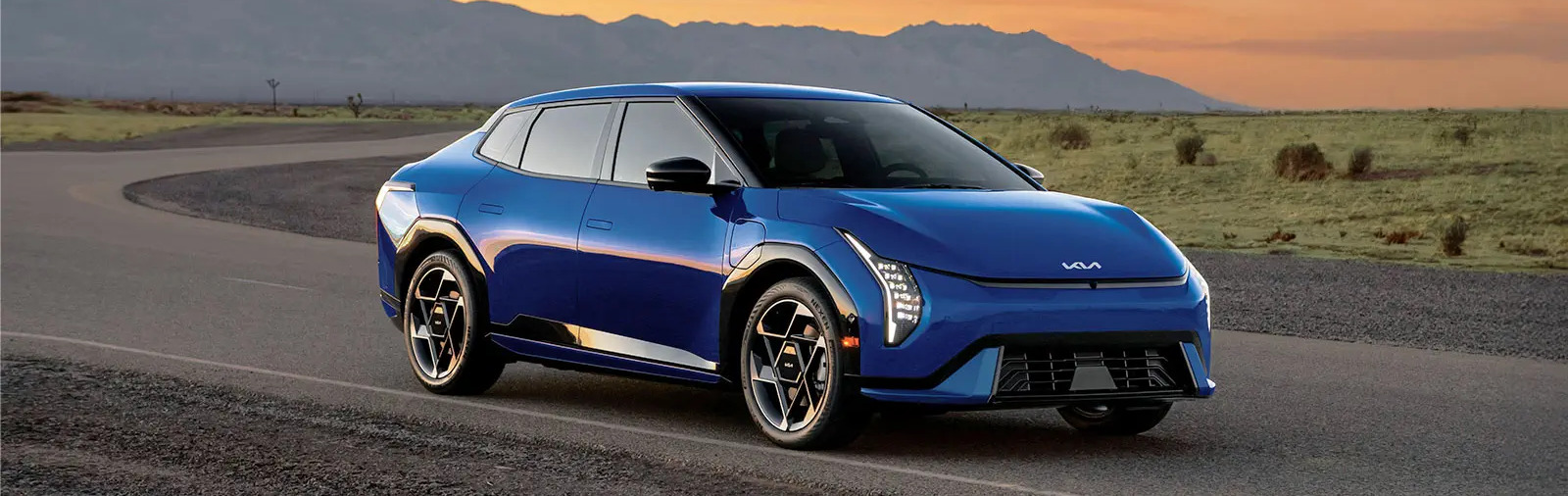 2026 Kia EV4 driving down street