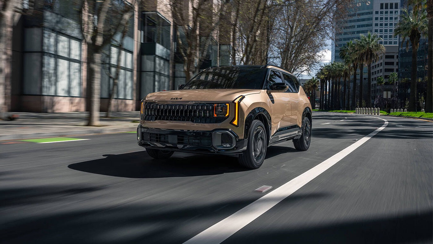 2027 Kia Seltos driving down road