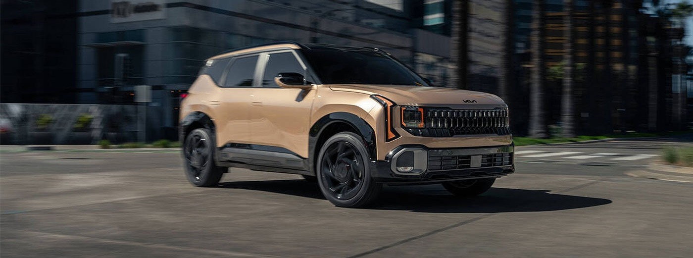 2027 Kia Seltos driving down street