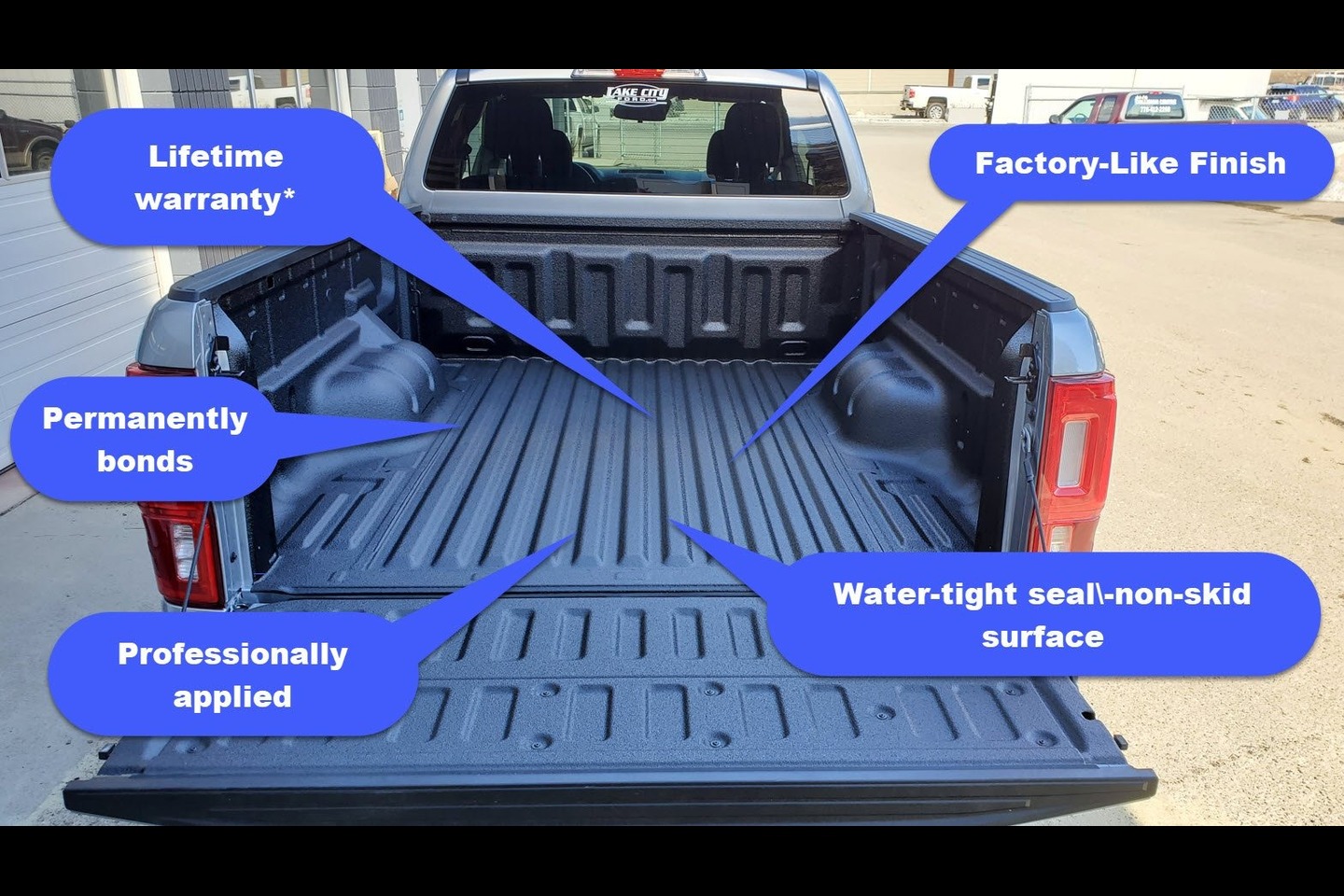 bed view image of a blue ford ranger with spray in bedliner