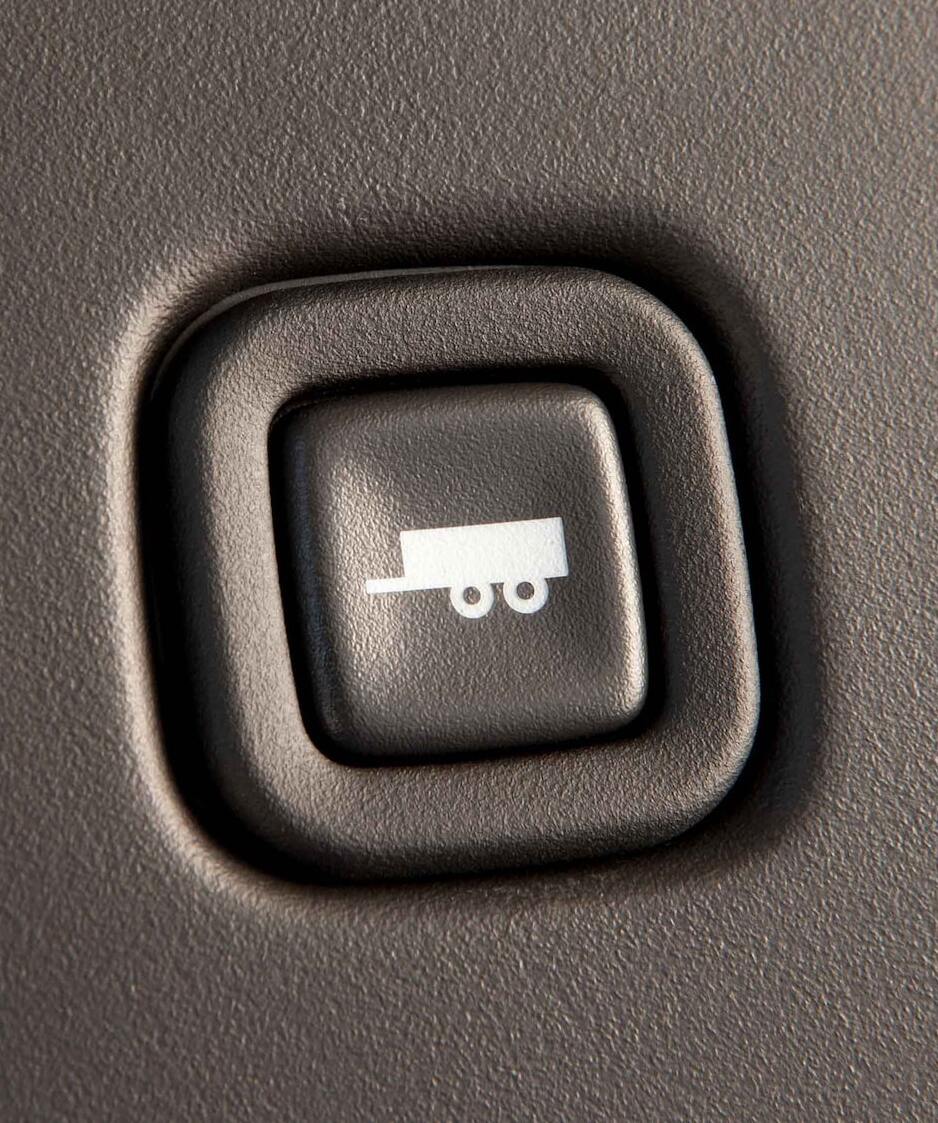 The tow/haul button on the dashboard of a 2025 GMC Savana Cargo or Passenger Van