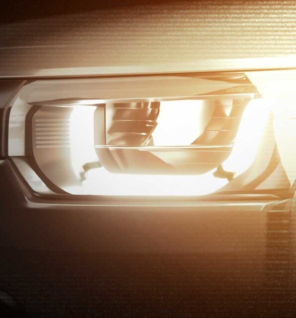 A close up of a headlamp on the 2026 Jeep Cherokee