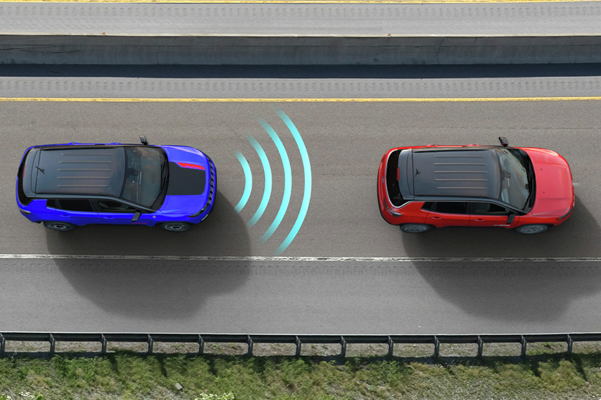 A top-down diagram demonstrating a 2026 Jeep Compass's front sonar detecting the vehicle ahead