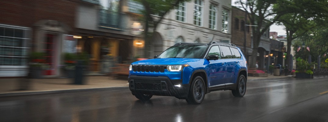 A photo of the 2026 Jeep Cherokee on the road.