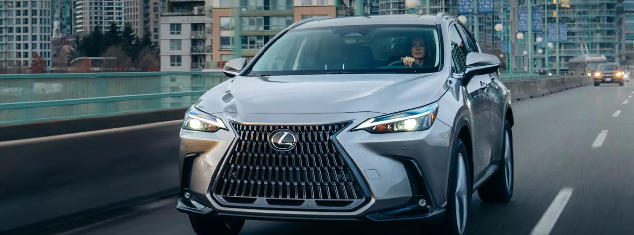 Lexus NX 350h driving down the highway