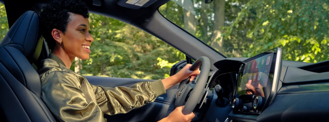 Black woman driving the 2026 Lexus RX