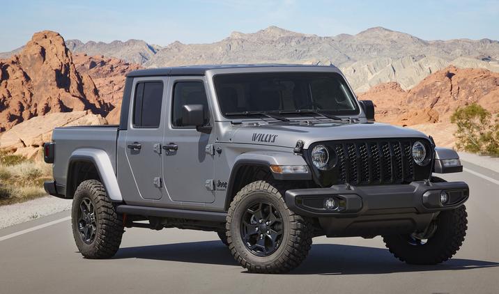 Silver Zynith 2022 Jeep Gladiator Willys parked in the middle of a road