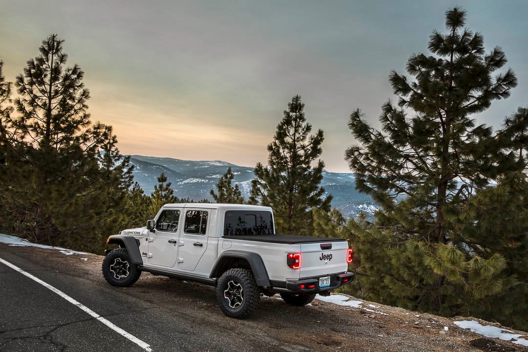 Bright White 2022 Jeep Gladiator stopped by the side of a mountain road