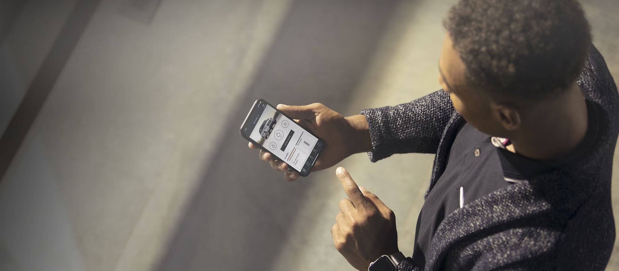 LincolnWayApp-ManWithPhone-Darkened