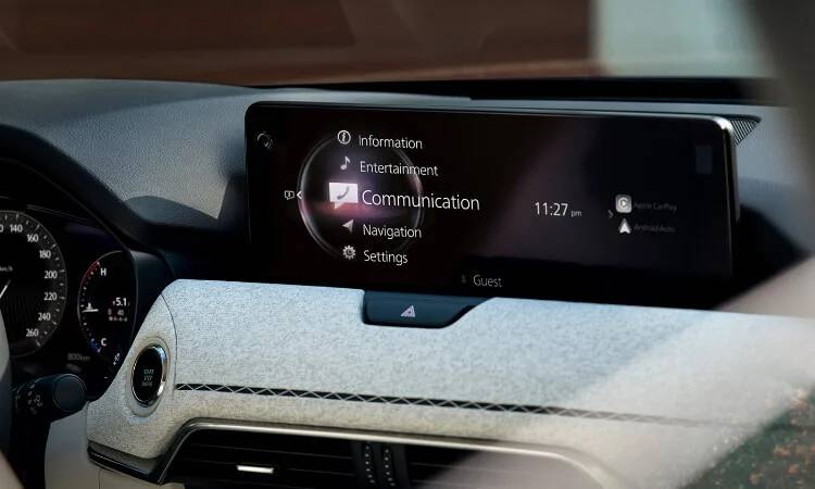 A view of the 2025 Mazda CX-90's dashboard and widescreen display
