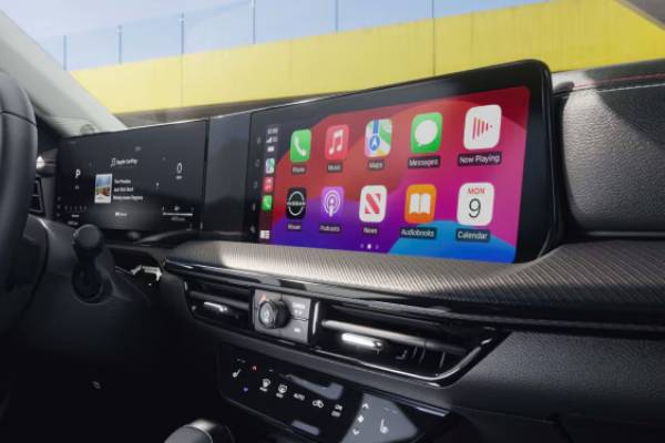 The dual displays aboard the 2026 Nissan Kicks, with the driver information display on the left, and the colourful infotainment touchscreen on the right filled with app widgets