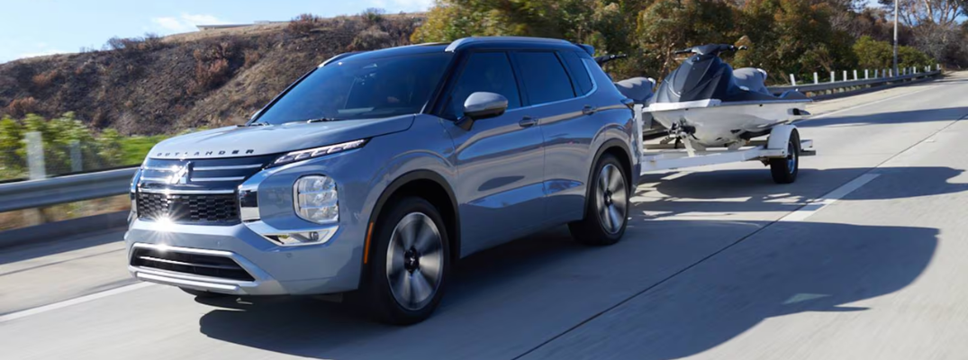 2026 Mitsubishi Outlander SUV towing jetski