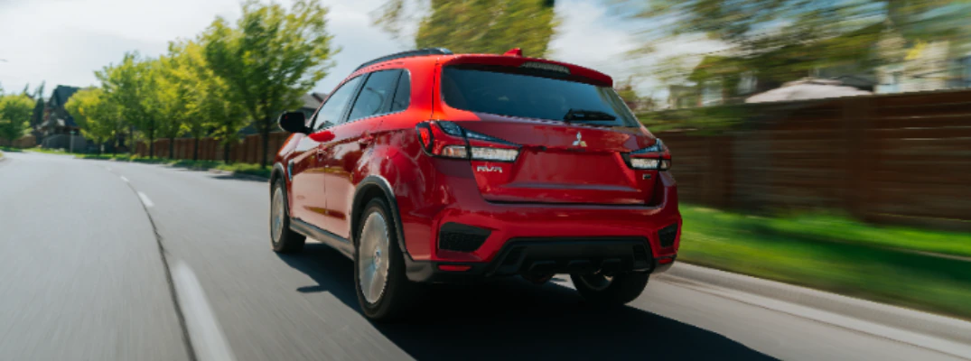 2026 Mitsubishi RVR driving down a neighborhood