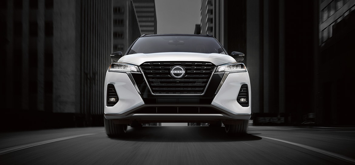 2024nissankicksinwhitefrontviewofvmotiongrille (1) Nissan Downtown