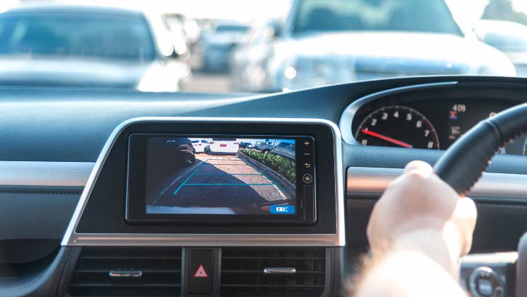 Close-up of rear view camera on display screen in vehicle