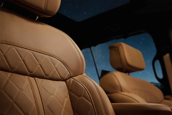 Brown leather seats from inside the 2026 Jeep Grand Wagoneer