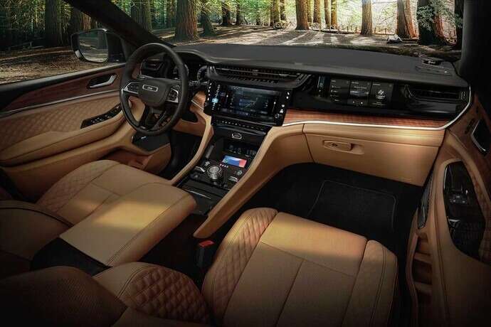 the front seats and dashboard of a 2026 jeep grand cherokee. 2026 jeep grand cherokee design at orangeville chrysler dodge jeep ram in orangeville, on