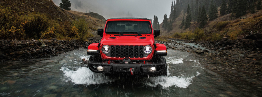 A Jeep Wrangler fording water