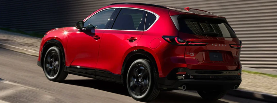 2026 Mazda CX-5 driving down a city street