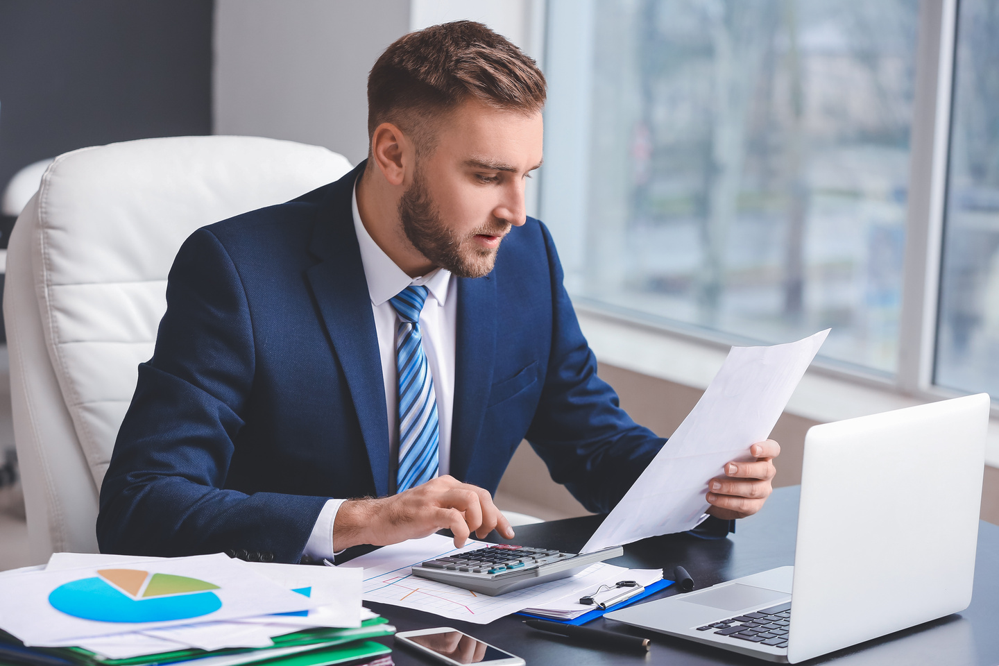 Unknown person looking at paperwork