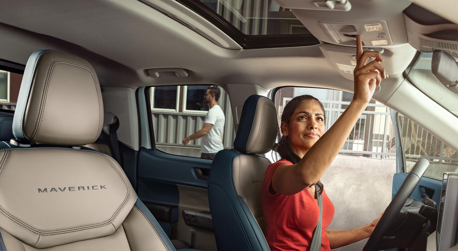 Unknown person opening 2026 Ford Maverick sunroof