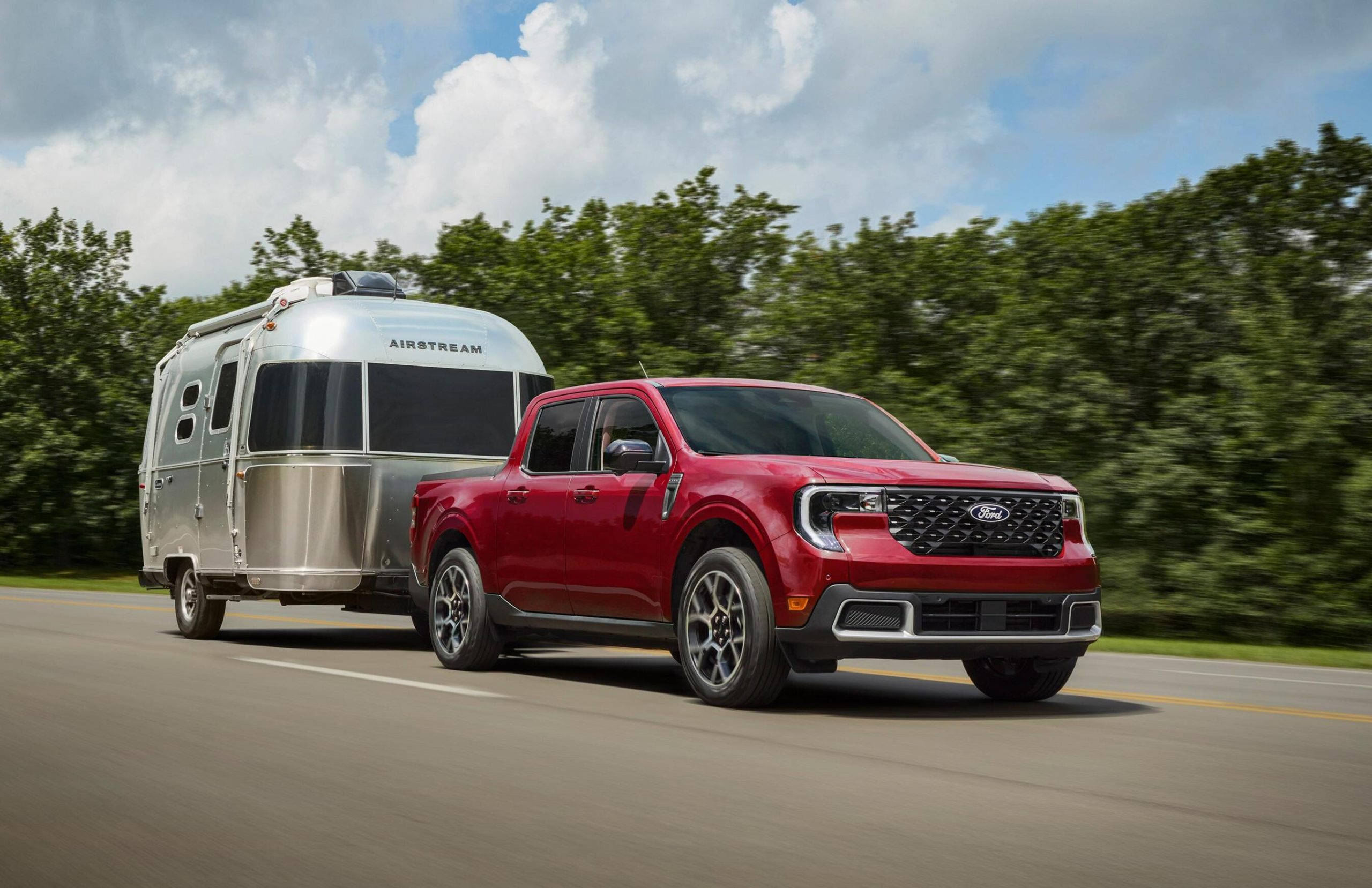 2026 Ford Maverick pulling trailer on road