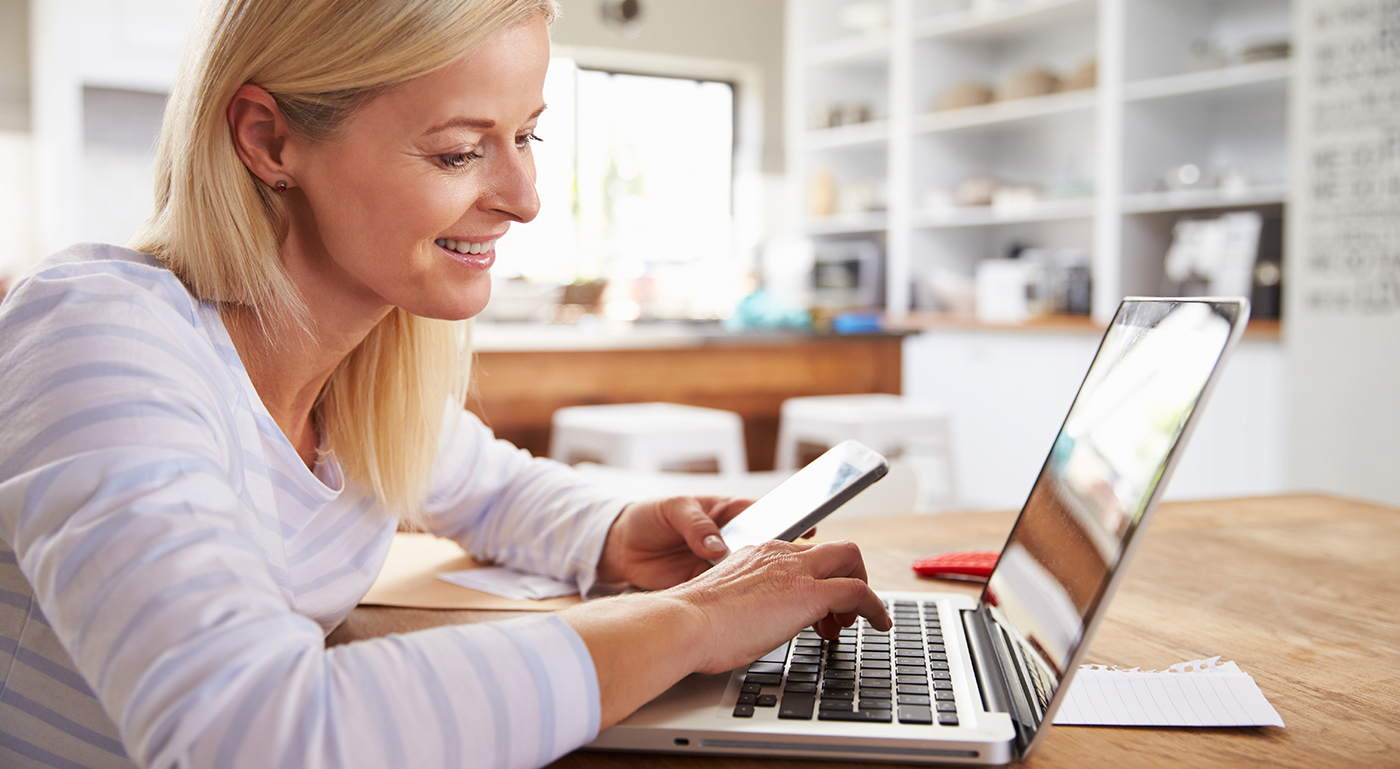 Unknown person using laptop