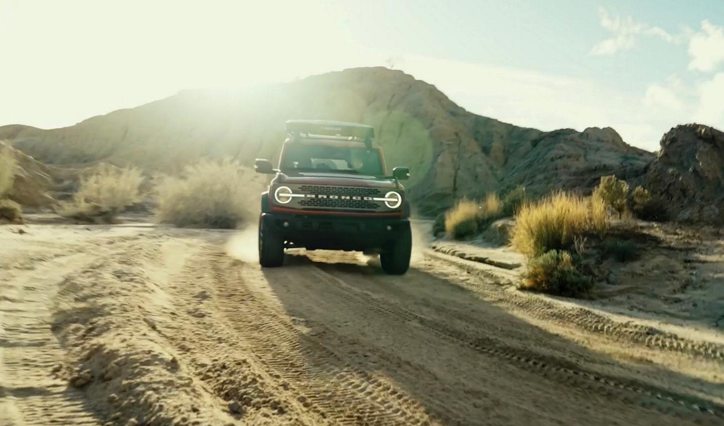 2026 Ford Bronco driving down dirt road