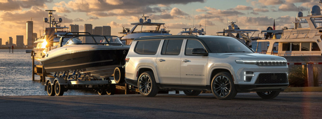 2026 Jeep Grand Wagoneer towing a boat