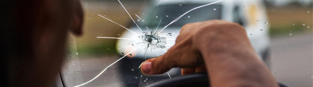 A close-up on a cracked windshield