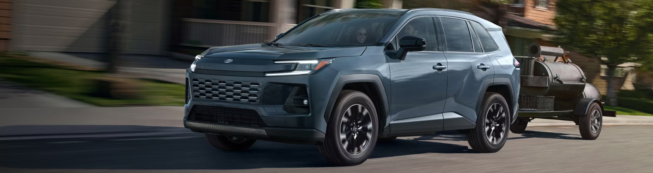 2026 Toyota RAV4 driving down road