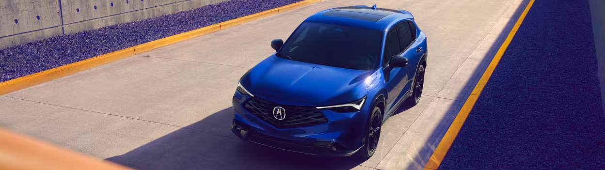 2025 Acura ADX driving on road during the day