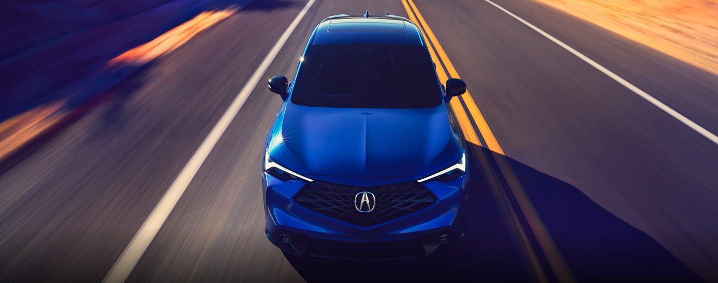 Exterior shot of 2025 Acura ADX driving on road