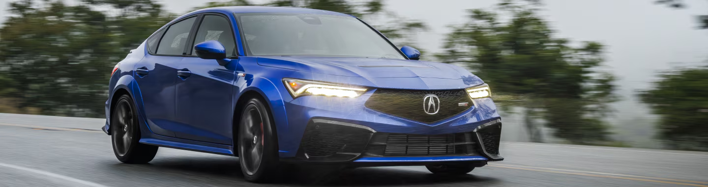 2025 Acura Integra driving on road