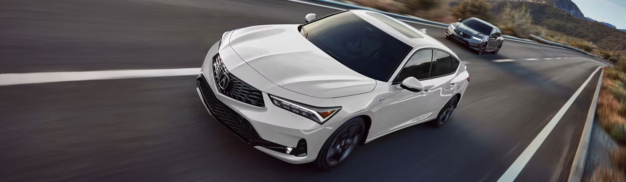 2025 Acura Integra driving on road