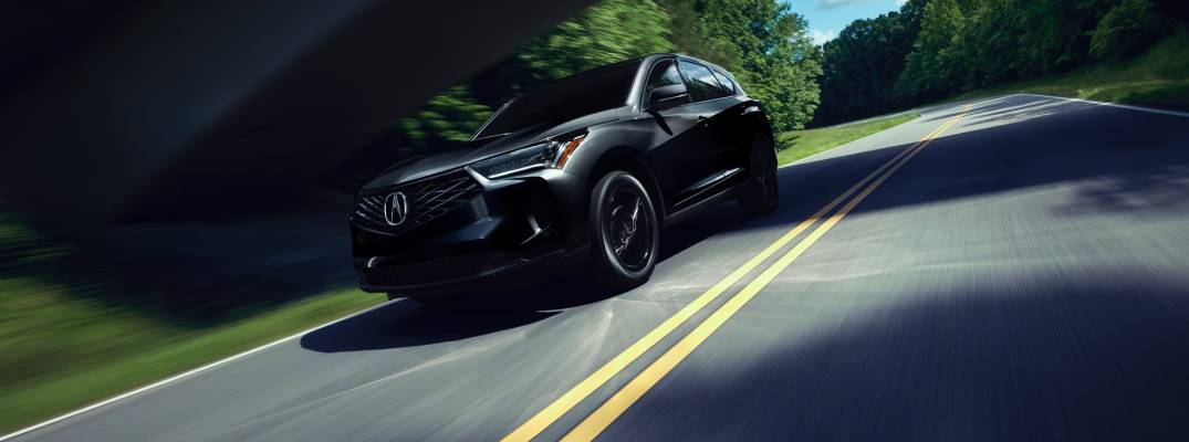 2026 Acura RDX driving down road
