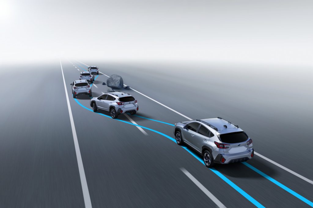 Illustration of a 2026 Subaru Crosstrek using EyeSight automatic emergency steering to swerve around a rock in its lane on the highway, with a blue path showing the assisted manoeuvre.